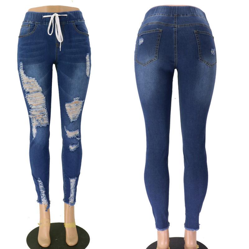 Ripped high-rise jeans - JWHL FASHION