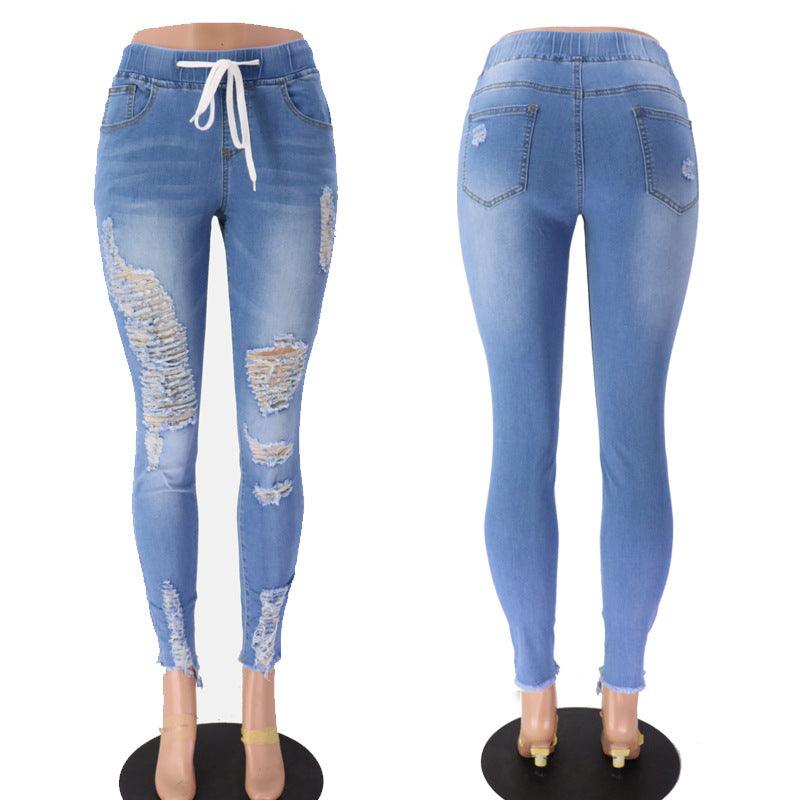 Ripped high-rise jeans - JWHL FASHION